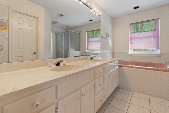 122 Clearview Ln, Fort Worth, TX 76126 - bathroom with tile patterned floors, double vanity, a stall shower, and a bath