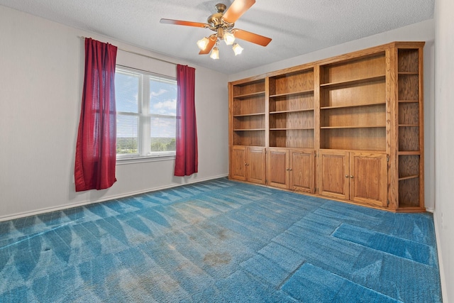 122 Clearview Ln, Fort Worth, TX 76126 - spare room featuring dark carpet, a ceiling fan, a textured ceiling, and baseboards