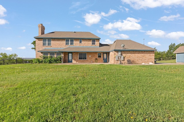 122 Clearview Ln, Fort Worth, TX 76126 - back of house with a chimney, brick siding, and a patio