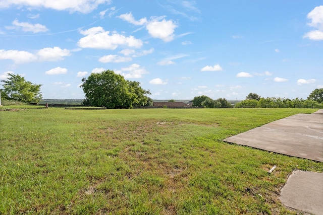 122 Clearview Ln, Fort Worth, TX 76126 - view of green lawn featuring a view of countryside and a patio