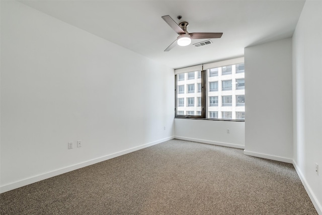 1200 Main St Unit 707, Dallas, TX 75202 - carpeted spare room with ceiling fan and baseboards