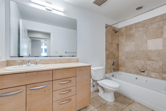 1200 Main St Unit 707, Dallas, TX 75202 - bathroom with toilet, vanity, shower / washtub combination, and tile patterned flooring