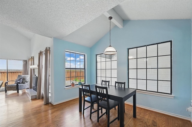 2708 Van Gogh Pl, Dallas, TX 75287 - dining room with wood finished floors, a textured ceiling, and baseboards