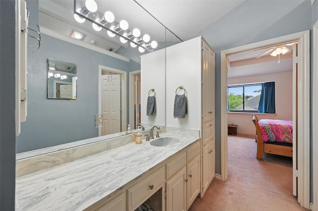 2708 Van Gogh Pl, Dallas, TX 75287 - ensuite bathroom featuring vanity, ceiling fan, baseboards, and a textured ceiling