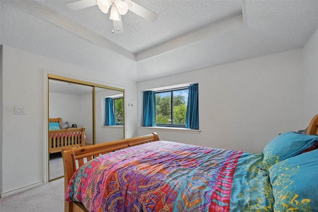 2708 Van Gogh Pl, Dallas, TX 75287 - carpeted bedroom featuring a textured ceiling, a ceiling fan, and a closet