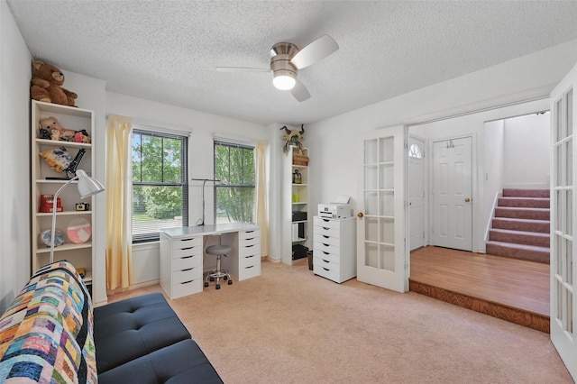 2708 Van Gogh Pl, Dallas, TX 75287 - home office with french doors, light colored carpet, ceiling fan, and a textured ceiling