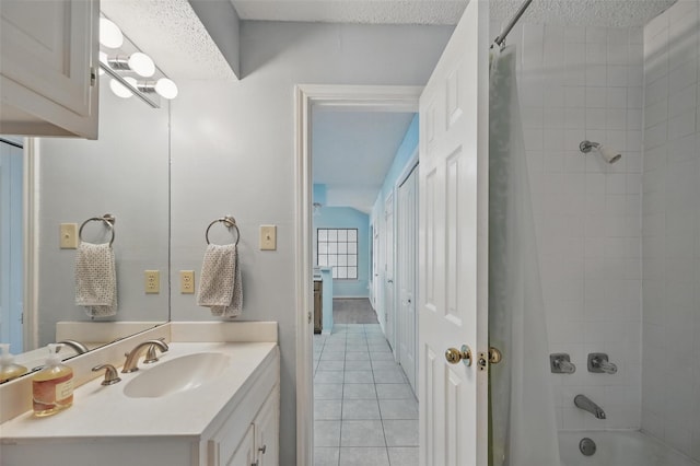 2708 Van Gogh Pl, Dallas, TX 75287 - full bathroom featuring tile patterned flooring, shower / tub combo with curtain, vanity, and a textured ceiling