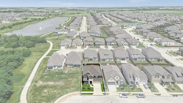 1017 Lade Ct, Celina, TX 75009 - aerial perspective of suburban area featuring a large body of water and property parcel outlined