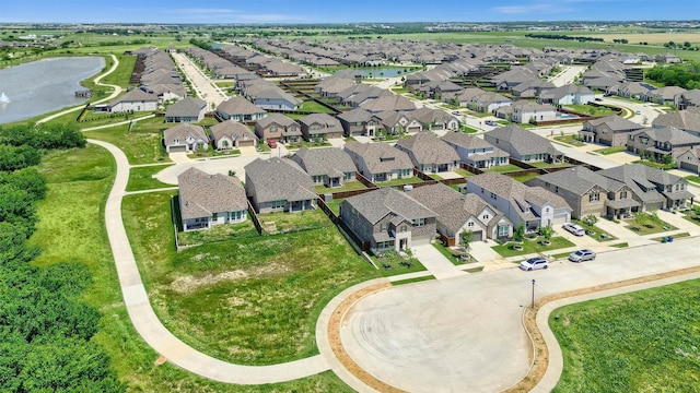 1017 Lade Ct, Celina, TX 75009 - aerial view of property and surrounding area featuring nearby suburban area and a large body of water