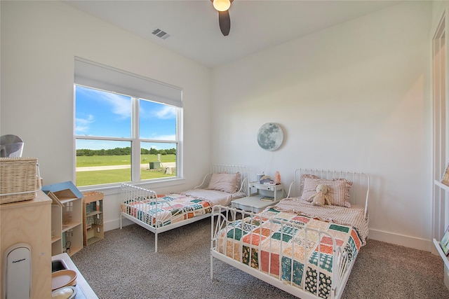 1339 Malone Dr, Royse City, TX 75189 - bedroom with carpet floors, baseboards, and a ceiling fan