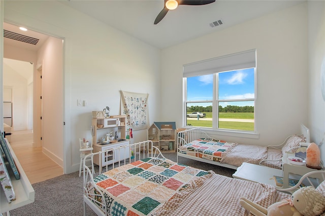 1339 Malone Dr, Royse City, TX 75189 - bedroom with carpet flooring, a ceiling fan, and baseboards