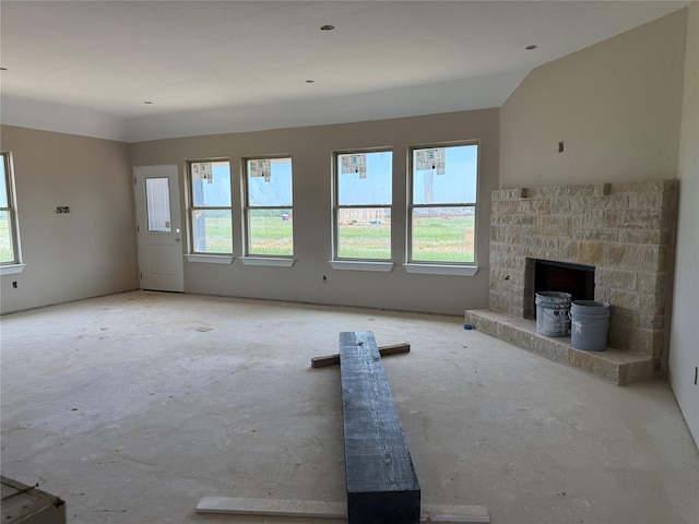 436 Guadalupe Trl, Springtown, TX 76087 - unfurnished living room with healthy amount of natural light and a fireplace
