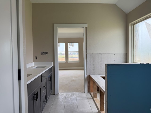 436 Guadalupe Trl, Springtown, TX 76087 - bathroom featuring lofted ceiling, tile patterned flooring, and vanity