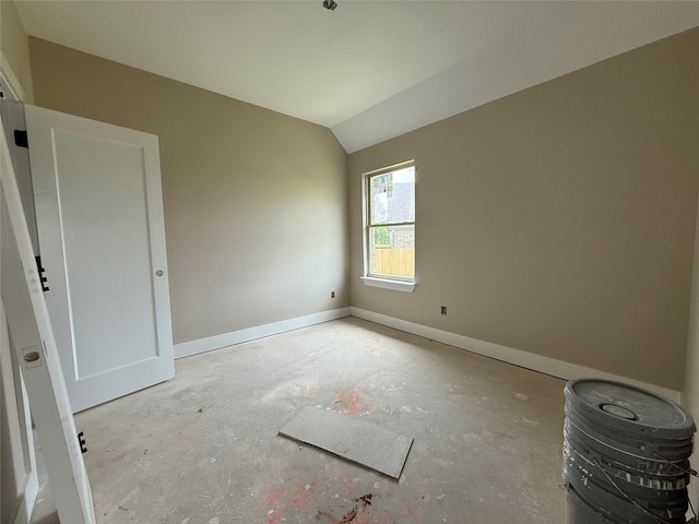 436 Guadalupe Trl, Springtown, TX 76087 - unfurnished room with unfinished concrete flooring, vaulted ceiling, and baseboards