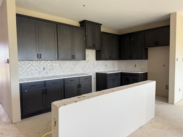 436 Guadalupe Trl, Springtown, TX 76087 - kitchen with decorative backsplash and unfinished concrete floors
