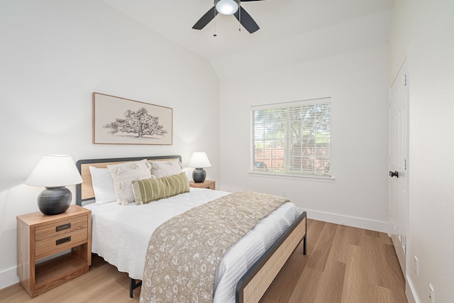 7901 Cross Plains Dr, Plano, TX 75025 - bedroom featuring wood finished floors, vaulted ceiling, baseboards, and a ceiling fan