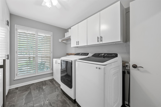 7125 Fish Pond Rd, Waco, TX 76710 - clothes washing area featuring washer and clothes dryer, dark marble finish flooring, a ceiling fan, baseboards, and cabinet space