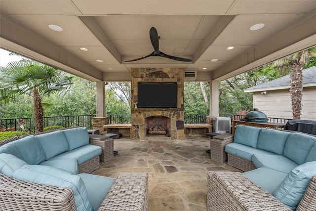 7125 Fish Pond Rd, Waco, TX 76710 - view of patio with an outdoor living space with a fireplace, a ceiling fan, and fence