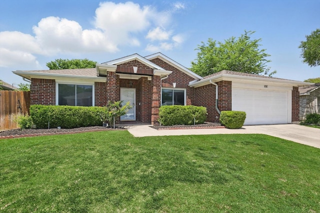 1010 Greenbriar Ln, Mckinney, TX 75069 - view of front of house featuring an attached garage, brick siding, and driveway