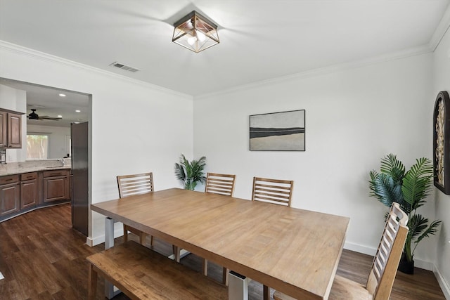 1010 Greenbriar Ln, Mckinney, TX 75069 - dining space with dark wood-style flooring, ornamental molding, baseboards, ceiling fan, and recessed lighting