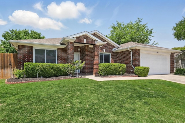 1010 Greenbriar Ln, Mckinney, TX 75069 - single story home featuring an attached garage, brick siding, and concrete driveway