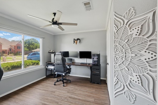 1010 Greenbriar Ln, Mckinney, TX 75069 - office space featuring ornamental molding, wood finished floors, a ceiling fan, and baseboards