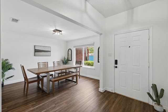 1010 Greenbriar Ln, Mckinney, TX 75069 - dining space with baseboards and dark wood finished floors