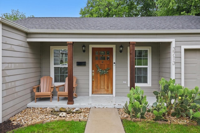 3713 Collinwood Ave, Fort Worth, TX 76107 - property entrance featuring a porch and roof with shingles