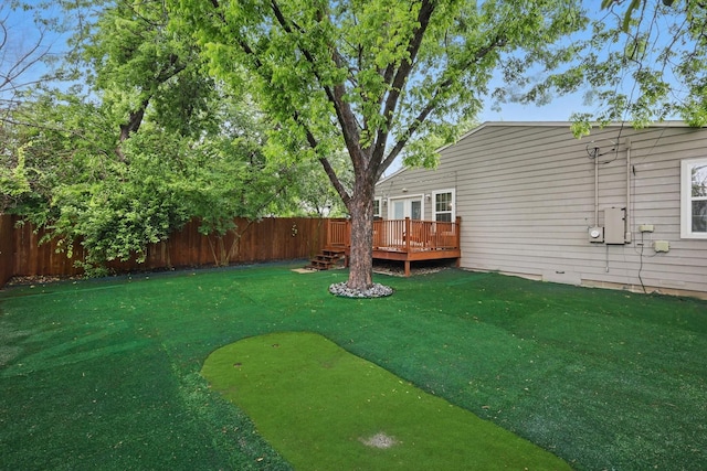 3713 Collinwood Ave, Fort Worth, TX 76107 - view of yard featuring a wooden deck and a putting green