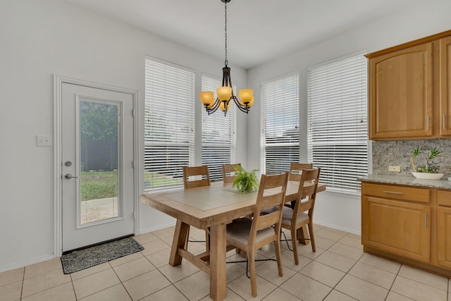 1804 Morning Mist Trl, Flower Mound, TX 75028 - dining area with a chandelier, plenty of natural light, and light tile patterned floors