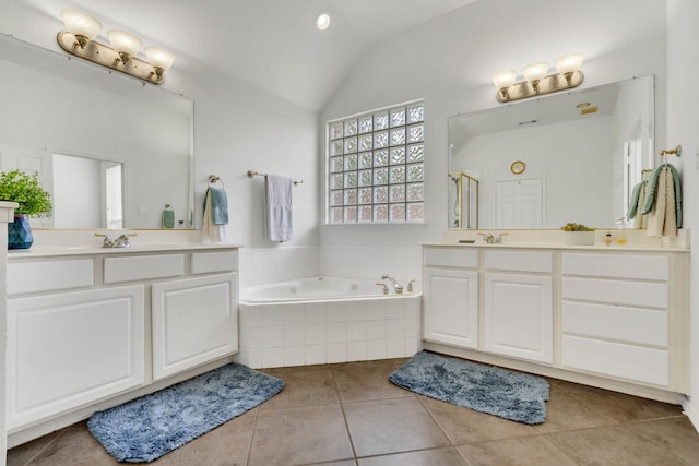 1804 Morning Mist Trl, Flower Mound, TX 75028 - bathroom with two vanities, a bath, lofted ceiling, and tile patterned flooring