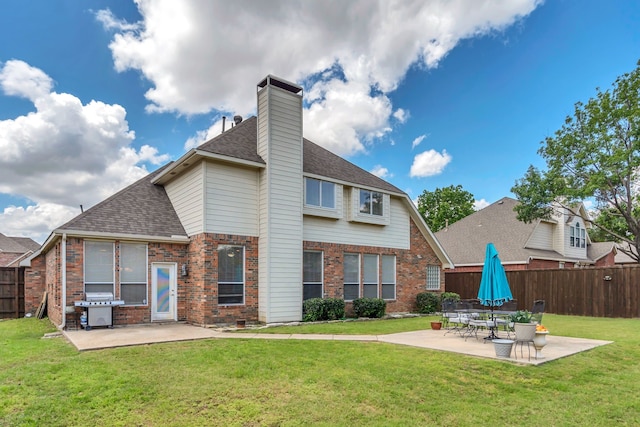 1804 Morning Mist Trl, Flower Mound, TX 75028 - rear view of property with a patio area, brick siding, roof with shingles, and a chimney