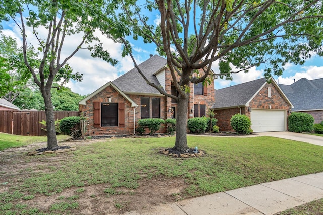 1804 Morning Mist Trl, Flower Mound, TX 75028 - traditional home featuring a shingled roof, brick siding, driveway, and a garage