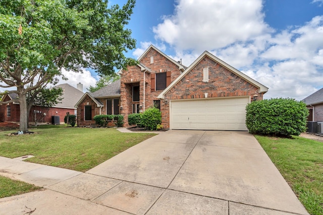 1804 Morning Mist Trl, Flower Mound, TX 75028 - traditional home featuring a front yard, concrete driveway, a garage, and brick siding