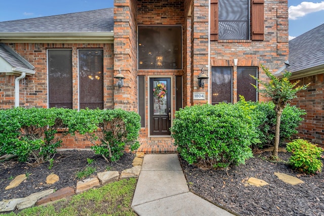 1804 Morning Mist Trl, Flower Mound, TX 75028 - property entrance featuring brick siding and roof with shingles