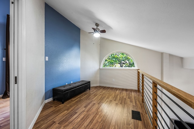 4242 N Capistrano Dr Unit 174, Dallas, TX 75287 - empty room featuring wood finished floors, a ceiling fan, and baseboards