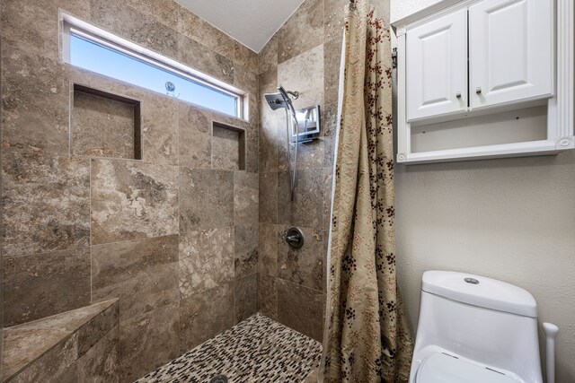 4242 N Capistrano Dr Unit 174, Dallas, TX 75287 - full bath featuring a textured wall and two vanities