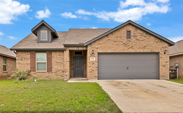 9220 Nevis Dr, Fort Worth, TX 76123 - view of front of home featuring brick siding, driveway, a front yard, and a garage