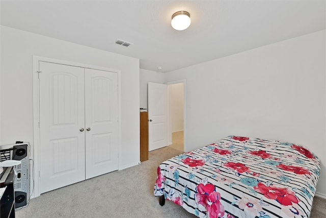 9220 Nevis Dr, Fort Worth, TX 76123 - bedroom with light carpet, a closet, and baseboards