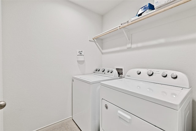 9220 Nevis Dr, Fort Worth, TX 76123 - clothes washing area featuring separate washer and dryer and baseboards