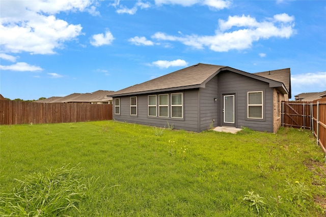 9220 Nevis Dr, Fort Worth, TX 76123 - rear view of house with a shingled roof