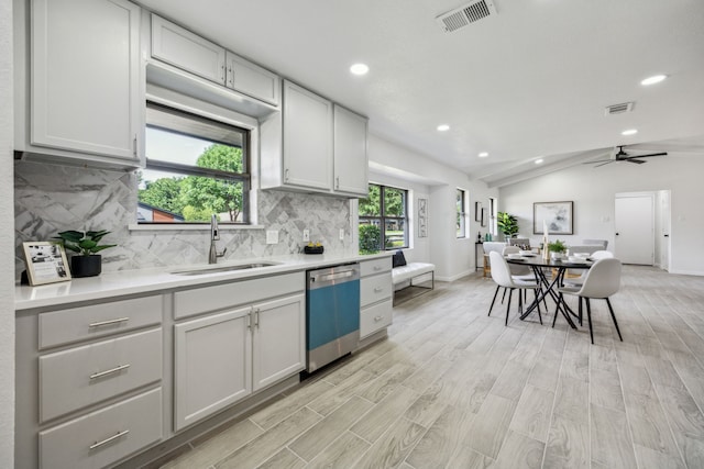101 Oakmont Dr, Trophy Club, TX 76262 - kitchen with dishwashing machine, a sink, recessed lighting, decorative backsplash, and light countertops