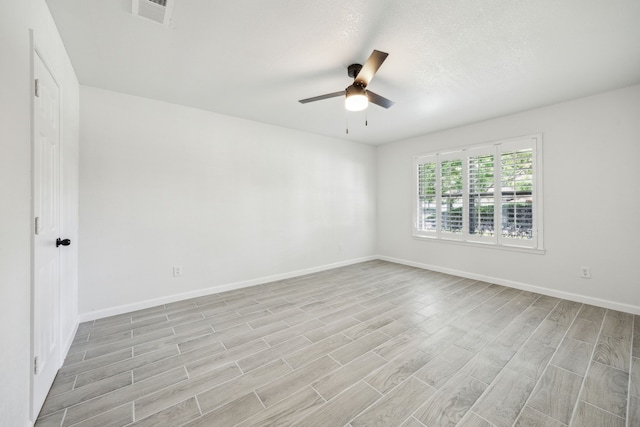 101 Oakmont Dr, Trophy Club, TX 76262 - spare room with a ceiling fan, baseboards, and light wood finished floors