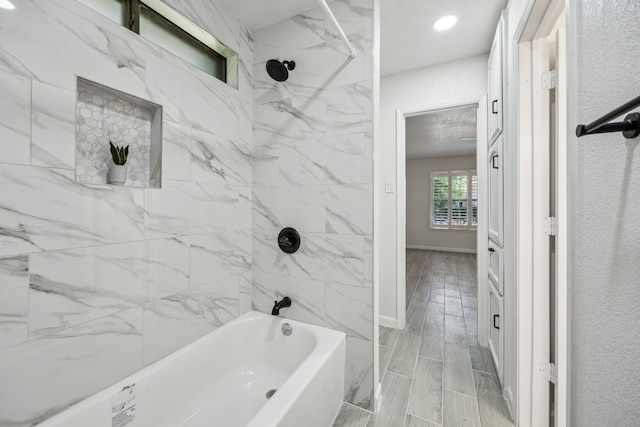 101 Oakmont Dr, Trophy Club, TX 76262 - bathroom with shower / bathtub combination, baseboards, and wood finished floors