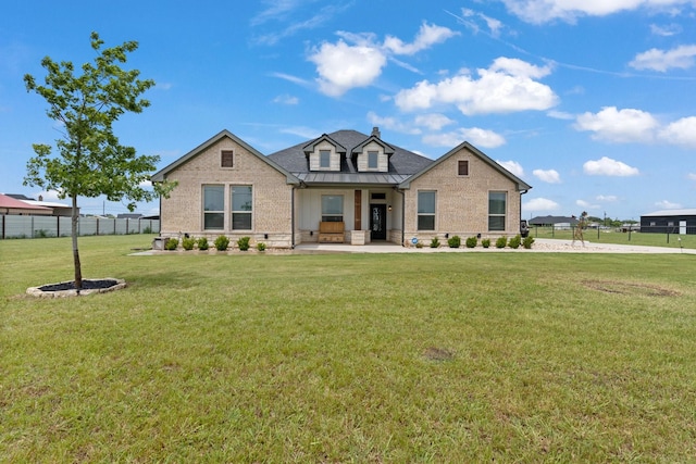 3304 Cobbler Ln, Joshua, TX 76058 - view of front of home with brick siding, a standing seam roof, and metal roof