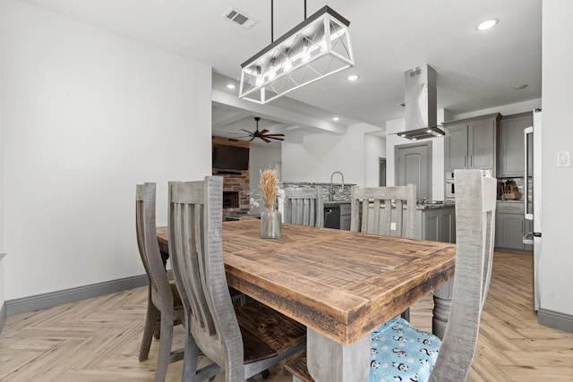 3304 Cobbler Ln, Joshua, TX 76058 - dining space with ceiling fan, baseboards, a brick fireplace, and recessed lighting