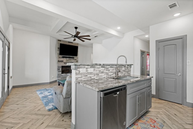 3304 Cobbler Ln, Joshua, TX 76058 - kitchen with dishwasher, a sink, open floor plan, gray cabinets, and recessed lighting