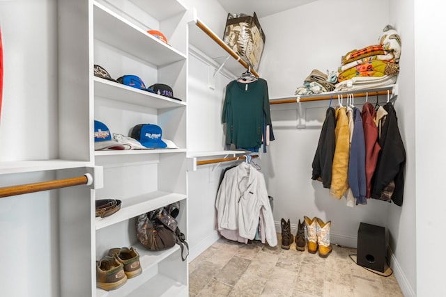 3304 Cobbler Ln, Joshua, TX 76058 - walk in closet with stone finish floors