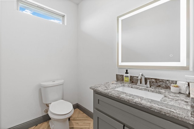 3304 Cobbler Ln, Joshua, TX 76058 - bathroom featuring toilet, vanity, and baseboards