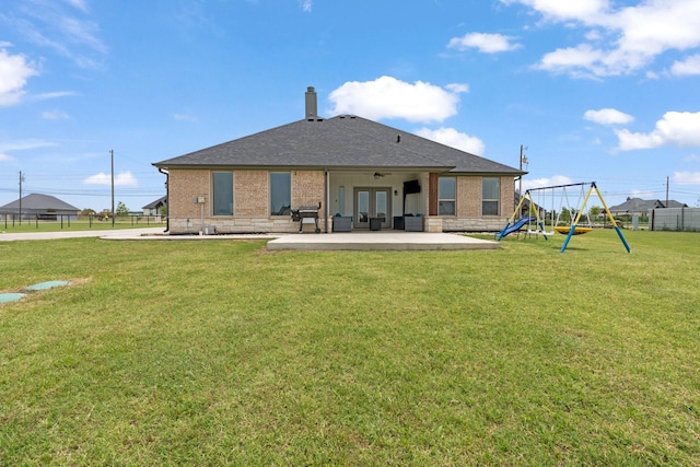 3304 Cobbler Ln, Joshua, TX 76058 - back of property featuring brick siding, a patio area, a playground, and a shingled roof